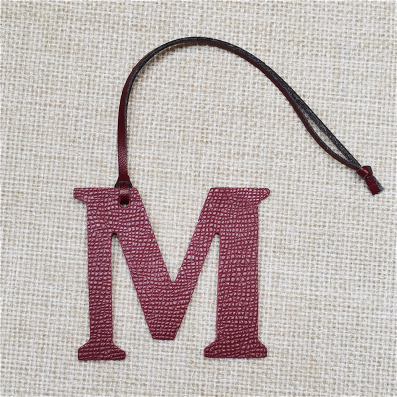 XMESSUN New English Letters M  - Monogram Keychain Leather 评论和价格