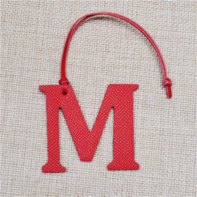 XMESSUN New English Letters M  - Monogram Keychain Leather 评论和价格